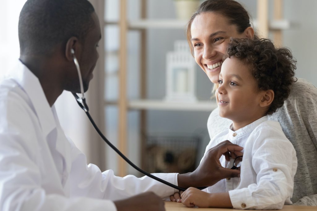 African Male Pediatrician Hold Stethoscope Exam Child Boy Patient for article on fastest-growing occupations