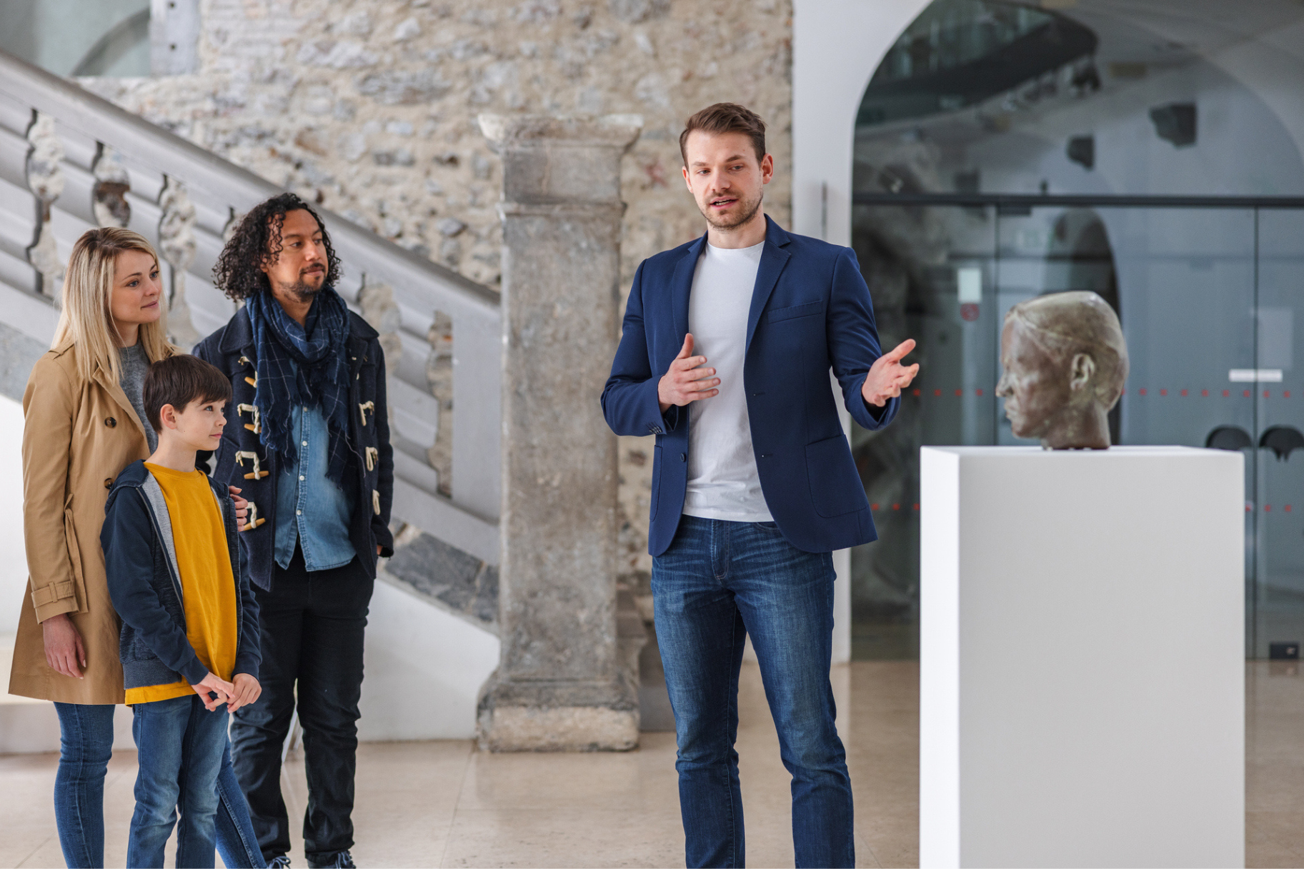 Read about: Man gestures to sculpture while giving tour to family in museum. In this article, learn how to be a museum curator and explore other jobs for creative people.