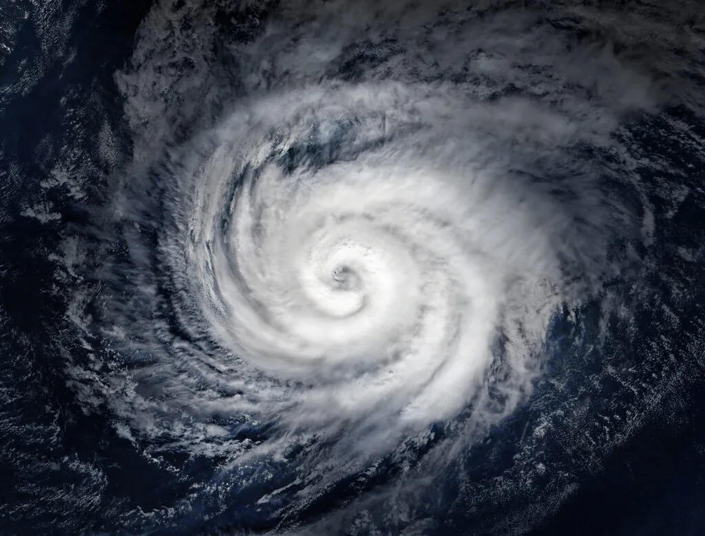 Aerial image of a hurricane over the water.